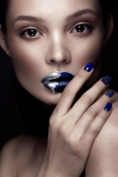 Beautiful girl with art make-up, dark glitter lips design and manicured nails. beauty face. - Photo, Image
