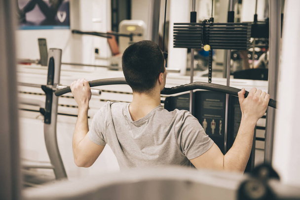 Young man in the gym - Photo, Image