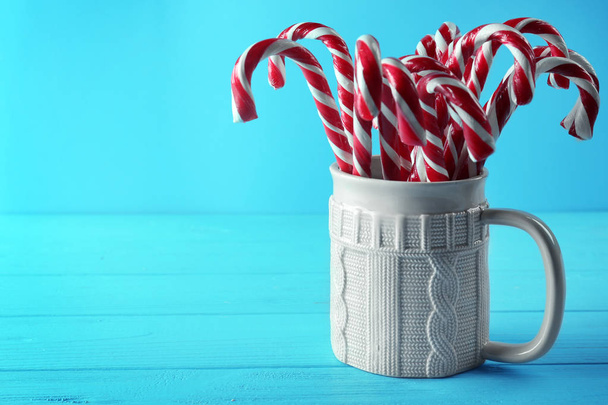 Candy canes in cup   - Foto, Imagem