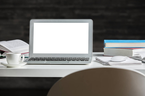 Workplace with white laptop - Фото, зображення