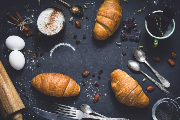 Fresh croissants, coffee and chocolate - Foto, imagen