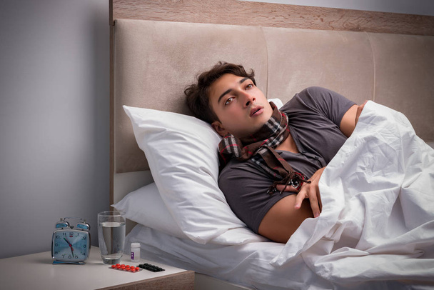Sick man resting in the bed - Photo, Image
