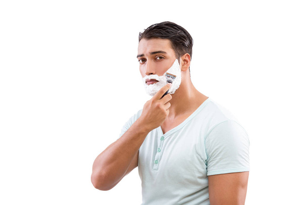 Jóképű férfi borotválkozás elszigetelt fehér - Fotó, kép
