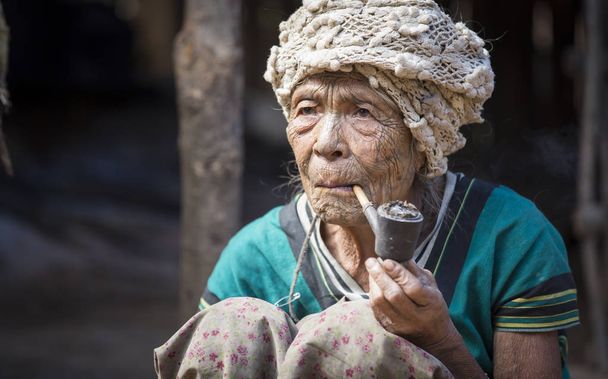 woman smoking pipe  - Photo, Image