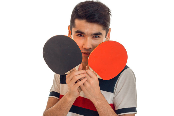 young sports man playing ping-pong isolated on white background - Φωτογραφία, εικόνα