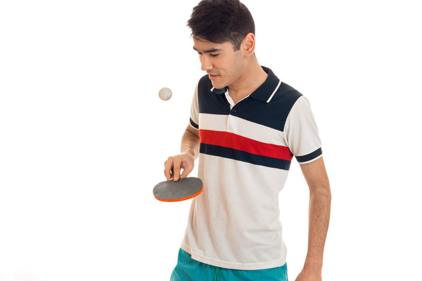young sports man practicing ping-pong isolated on white background - Φωτογραφία, εικόνα