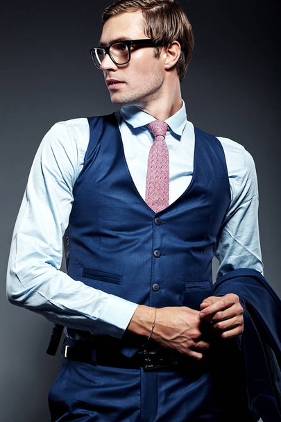  handsome businessman male model in blue suit  posing in studio - Φωτογραφία, εικόνα