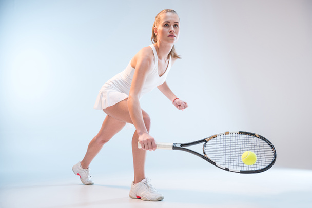 woman with tennis racket - 写真・画像