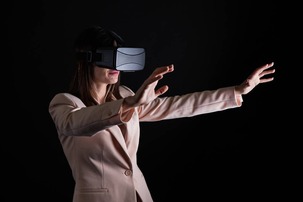 Businesswoman playing virtual reality simulation - Фото, зображення