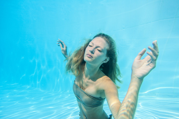 Young woman underwater - Photo, image