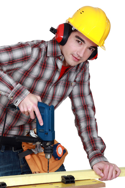 Woodworker using drill - Foto, Bild