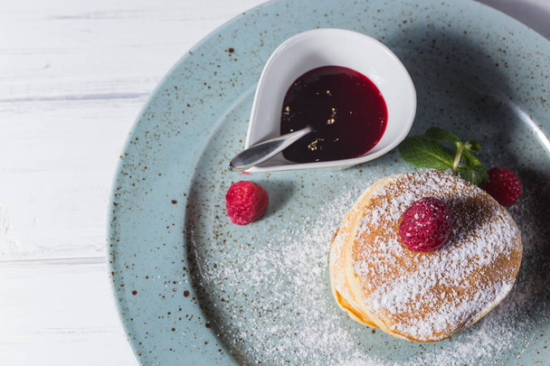 Pancakes with jam and icing sugar - Photo, Image