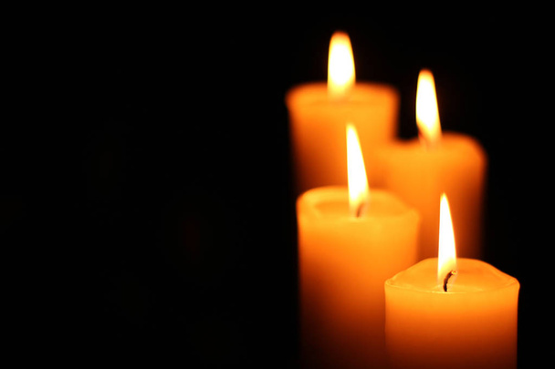 four candles right on stairs - Foto, Imagem