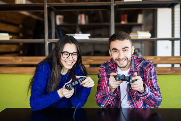 cute couple playing video games - Photo, Image