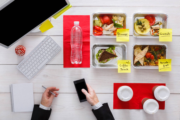 Healthy daily meals in office, top view on table. - Photo, Image