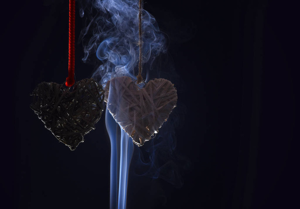 valentines day hearts on red rope in smoke - Photo, image