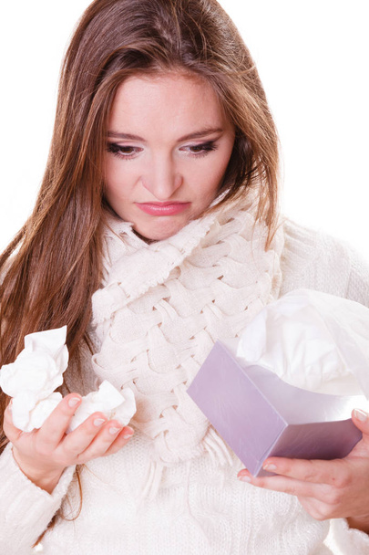 Sick woman girl with fever sneezing in tissue - Foto, Bild