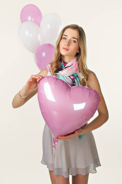 Sweet girl in spring style with baloons. Valentine day - Fotografie, Obrázek