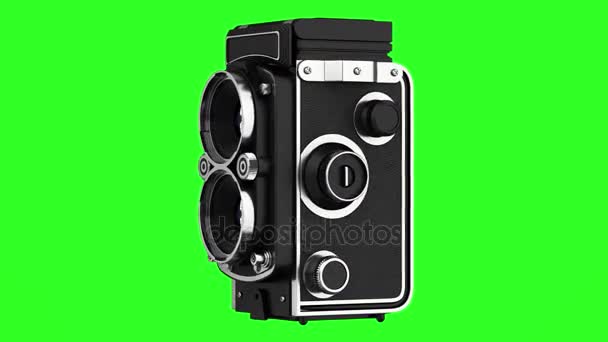 vintage film foto camera lus draaien op groene chromakey achtergrond - Video