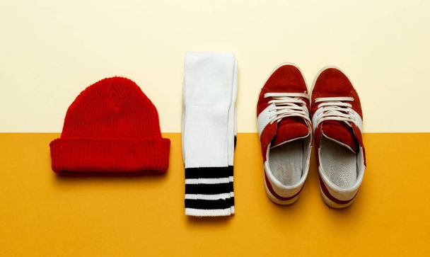 Urban Style Clothing. Skateboard fashion outfit. Hat, socks, sne - 写真・画像