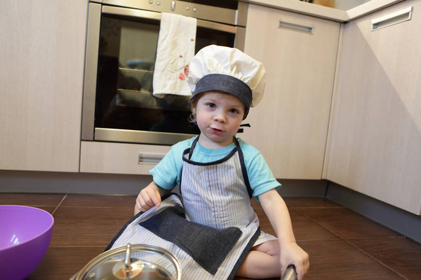 Cook boy on floor - Foto, Imagem