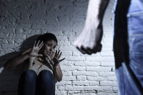 terrified woman attacked and abused by drunk husband in domestic violence concept - Fotó, kép