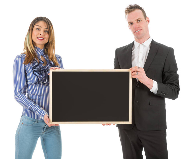 Business man and woman with empty chalkboard - 写真・画像