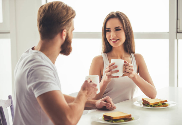 Couple having a breakfast - Фото, изображение