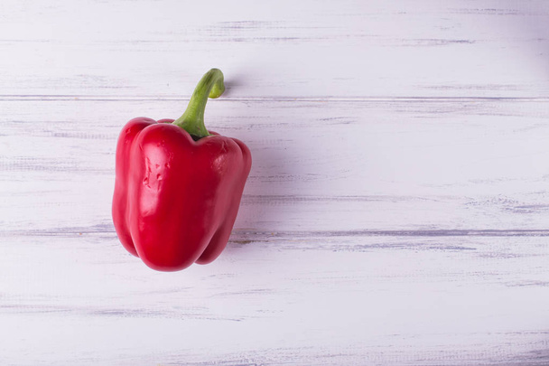 Pepper on wooden background - Photo, Image