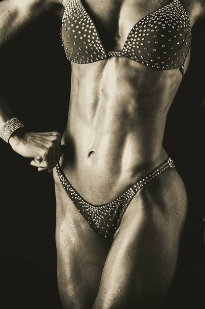 background on female bodyfitness - Foto, afbeelding