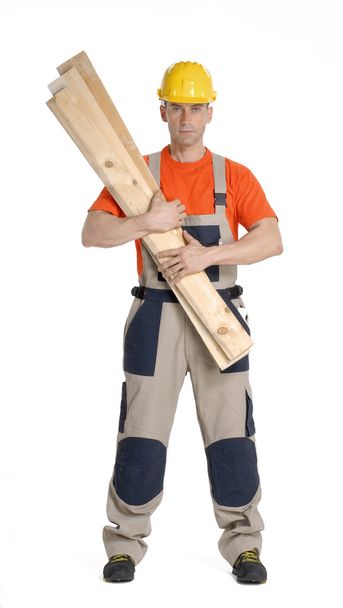 Worker holding a hood boards - Zdjęcie, obraz