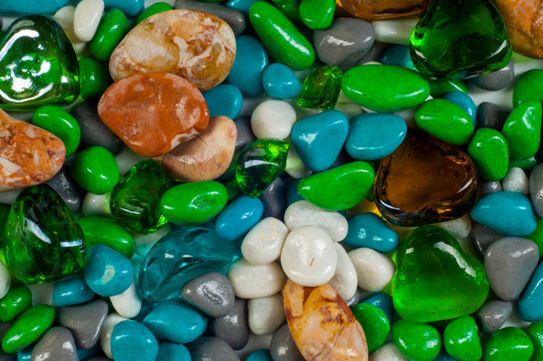 texture, background. Marine pebbles. Background of pebbles, various shells and glass hearts. stones background.  - Photo, Image
