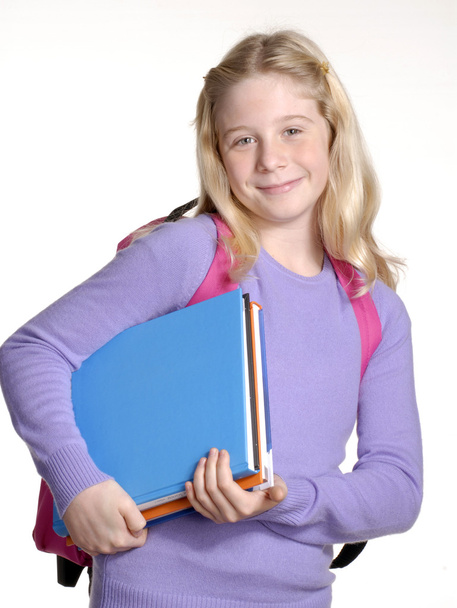 Schoolgirl portrait on white background. - Foto, afbeelding