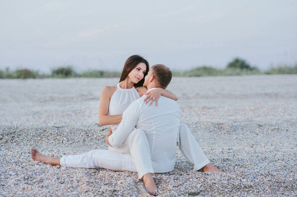 beautiful couple on the beach - Zdjęcie, obraz