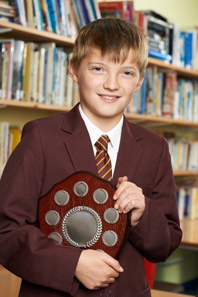 Portrait Of Pupil In Uniform Holding Award - Fotografie, Obrázek