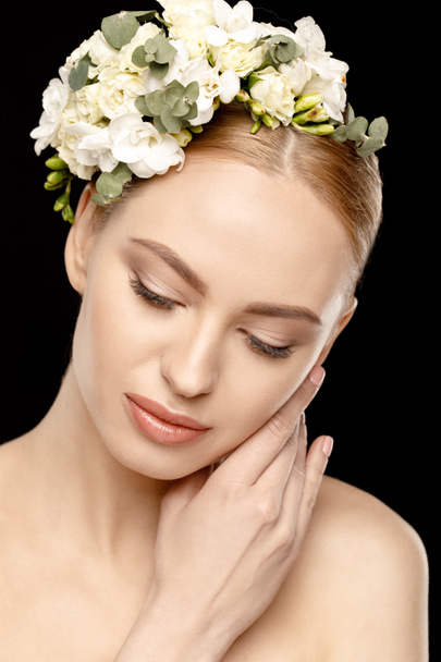 woman with flowers in hair - Photo, Image