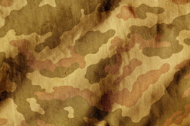 Weathered camouflage cloth texture. - Photo, Image