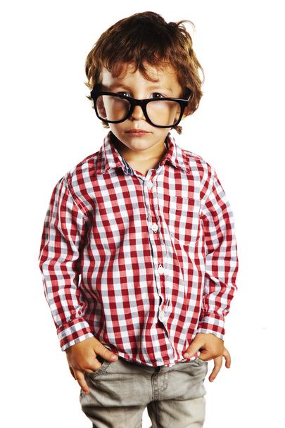 Child with rimmed glasses and hands in pockets - Photo, image