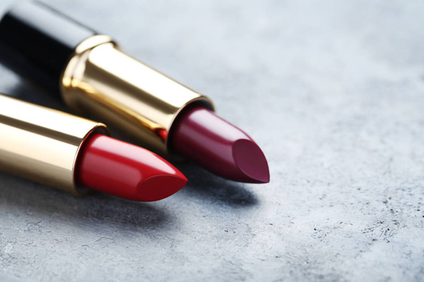 Two Colorful lipsticks  - Foto, afbeelding