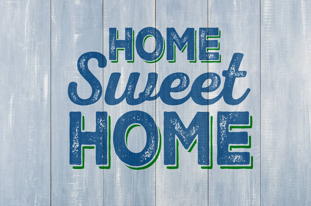 Μπλε ξύλινο τείχος με την επιγραφή σπίτι γλυκό σπίτι - Φωτογραφία, εικόνα