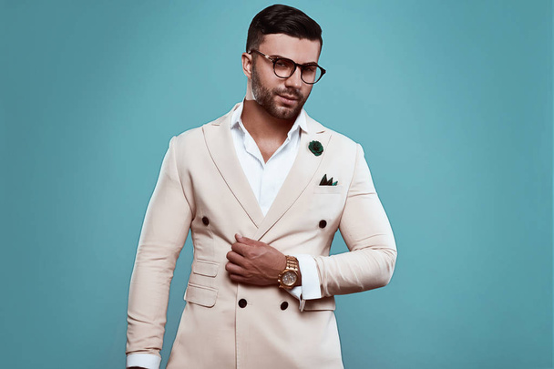 elegant brutal sexy man in suit and glasses - 写真・画像