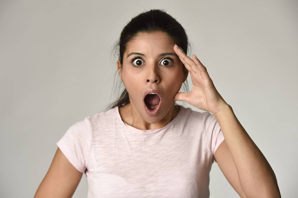 young beautiful surprised woman amazed in shock and surprise with mouth big opened - Photo, Image