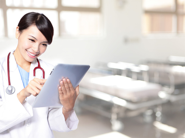 surgeon woman doctor using tablet pc - Photo, Image