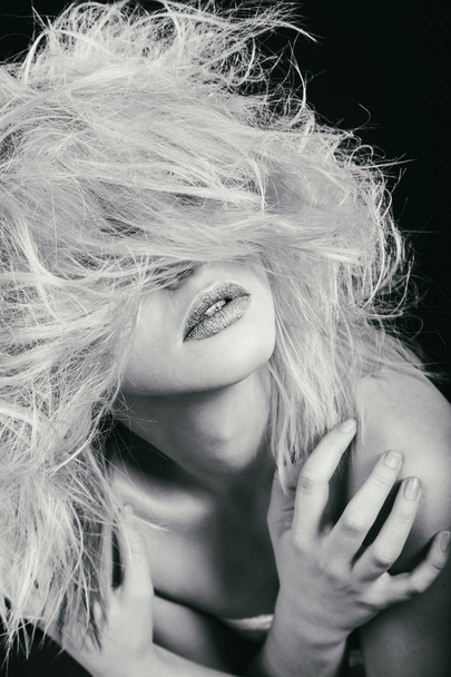 Beauty fashion blond on a dark background. - Photo, Image