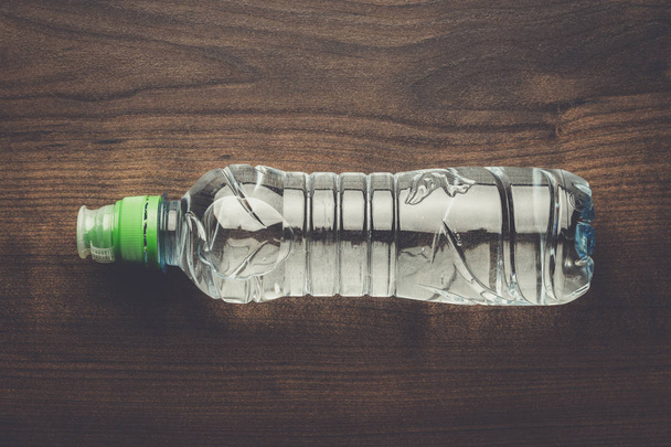 plastic water bottle on the table - Foto, Bild
