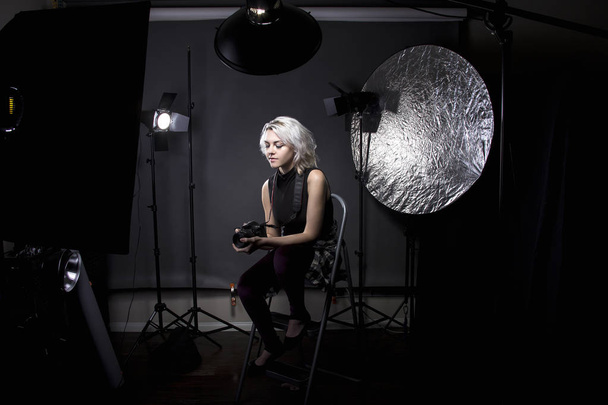 Female Professional Photographer in a Studio - Photo, Image