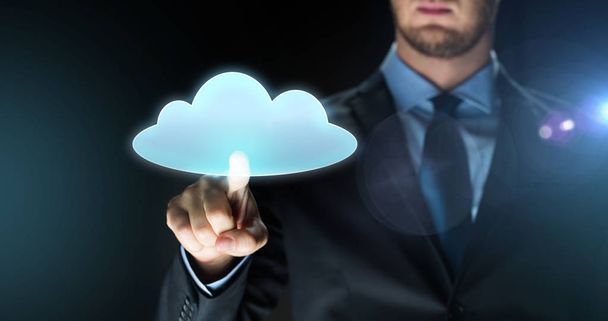 businessman touching virtual cloud projection - Fotó, kép