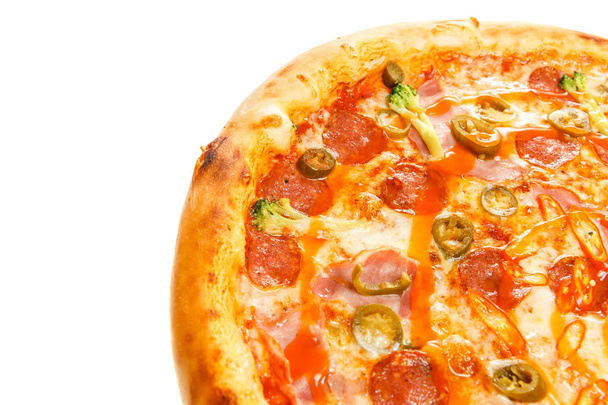 Delicious classic italian Burning Pizza with sausages, pepper, jalapeno sauce and cheese - Fotografie, Obrázek