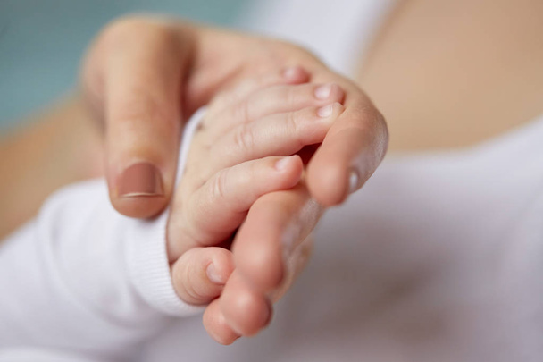 close up of mother and newborn baby hands - Fotoğraf, Görsel