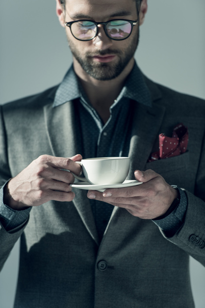 людина з чашкою кави
 - Фото, зображення